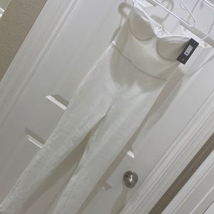 NWT Ivory stretchy skinny leg jumpsuit.